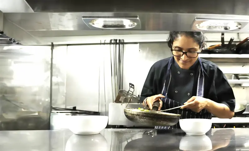 Chef Shilpa at the pass at Pure Indian Cooking, Indian restaurant in Fulham